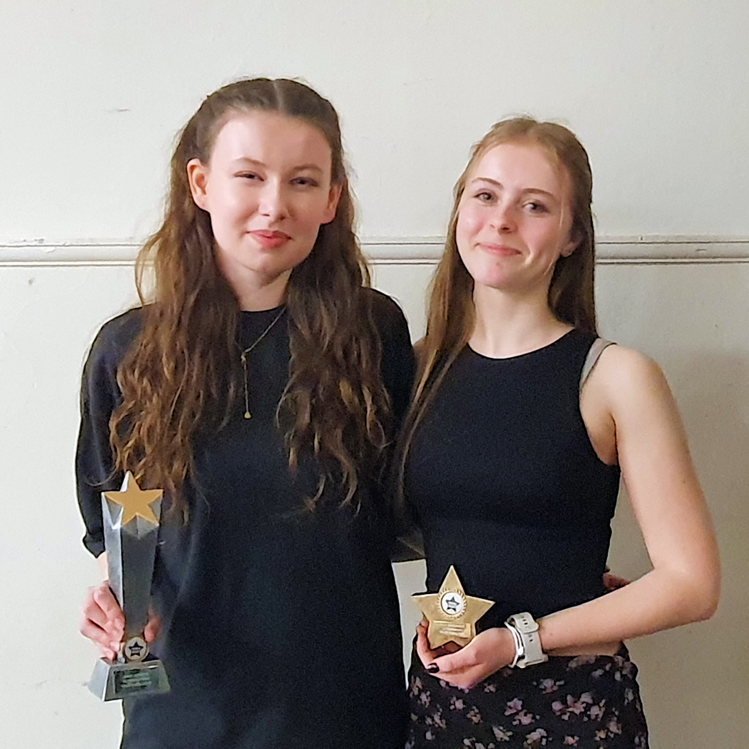 Emily and Erin with their trophies for Long Service
